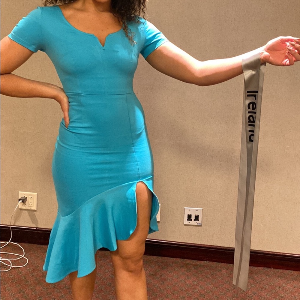 a symmetrical blue cocktail midi dress